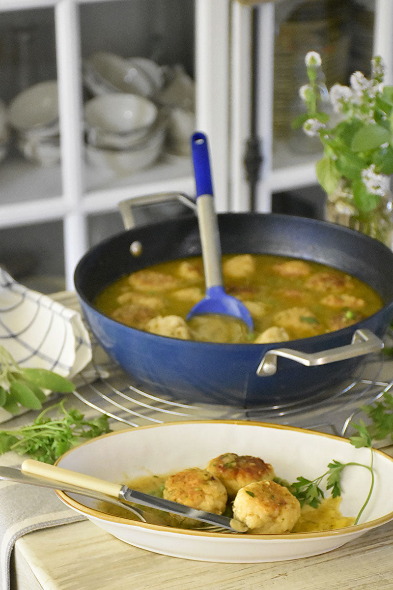 Seehecht-Frikadellen in grüner Sauce