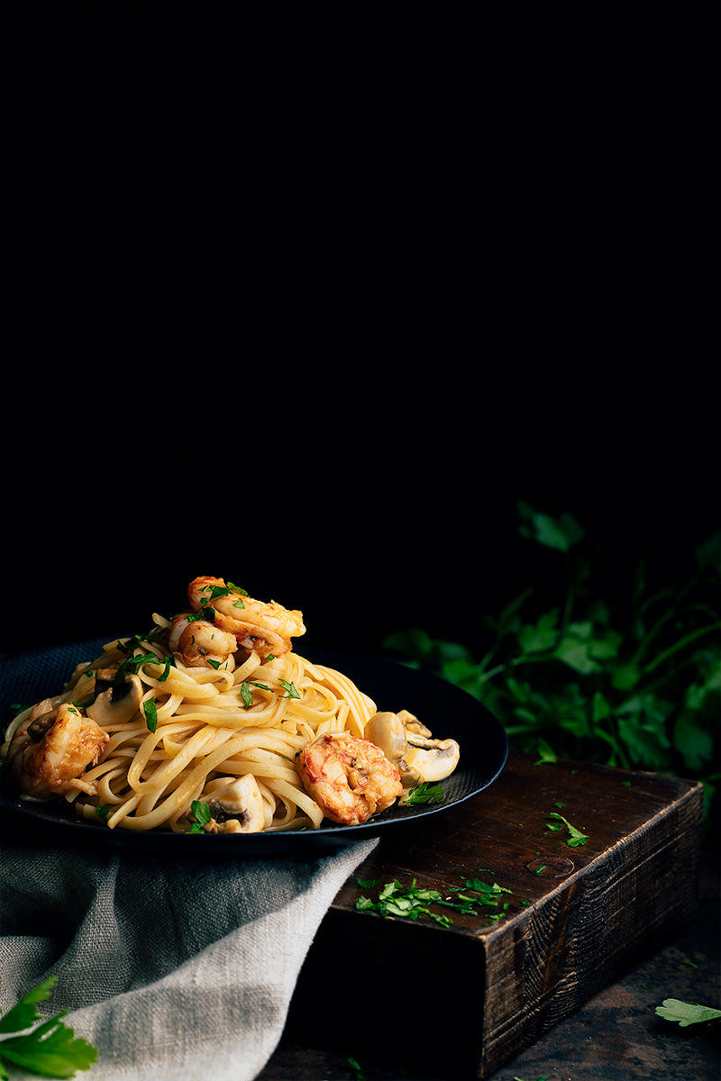 Tagliatelle mit Garnelen und Pilzen