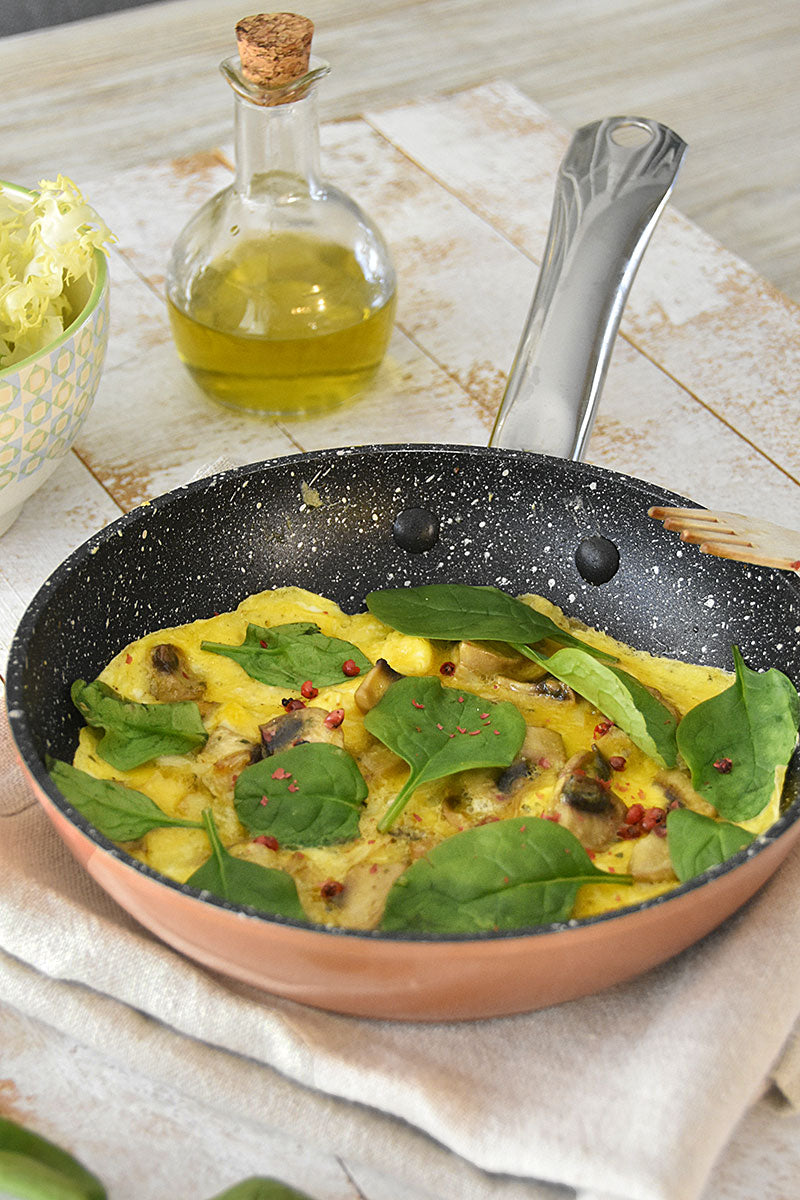 Tortilla aperta di funghi con spinaci