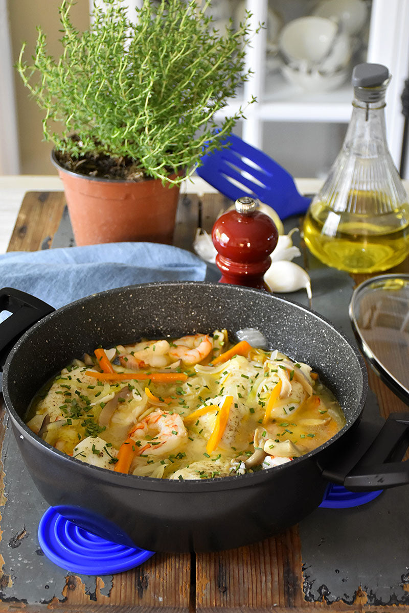 Merluza con setas y gambas