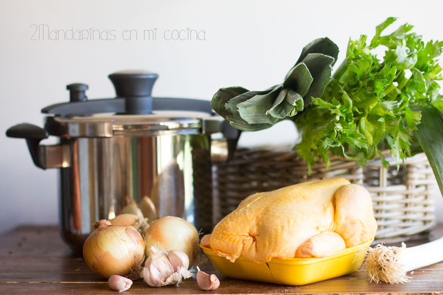 Homemade chicken soup in a pressure cooker