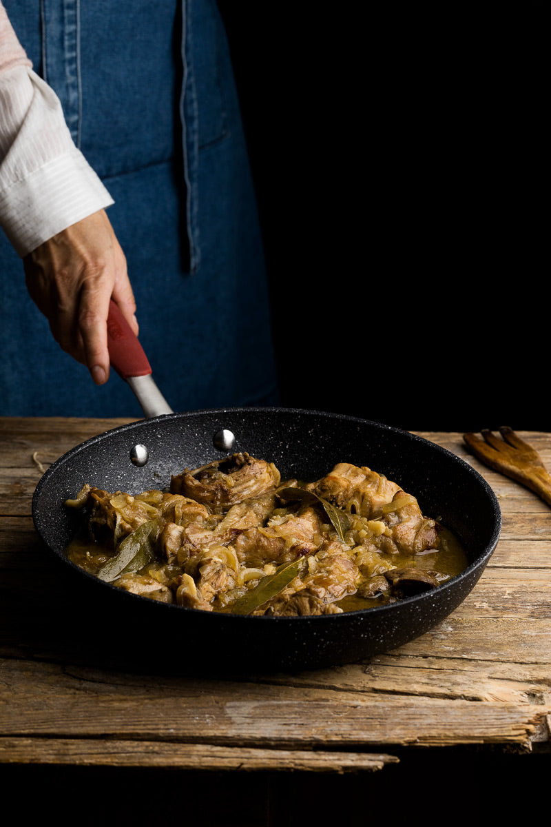 Stufato di coniglio con cipolle